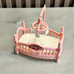 Plastic Dolls House Cradle Bed with Pastel Colors & Intricate Lace Patterns
