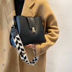 Minimalist Bucket Bag with Geometric Strap