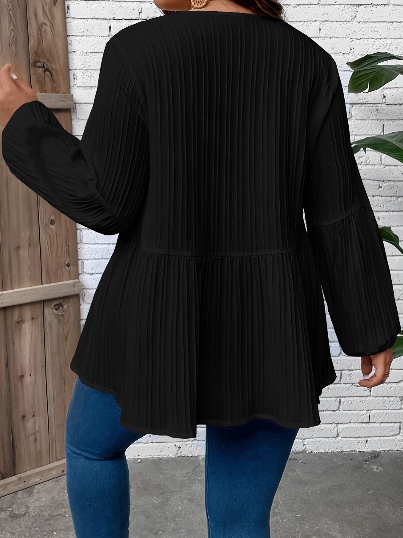  Solid Ribbed Lantern Sleeve Peplum Top