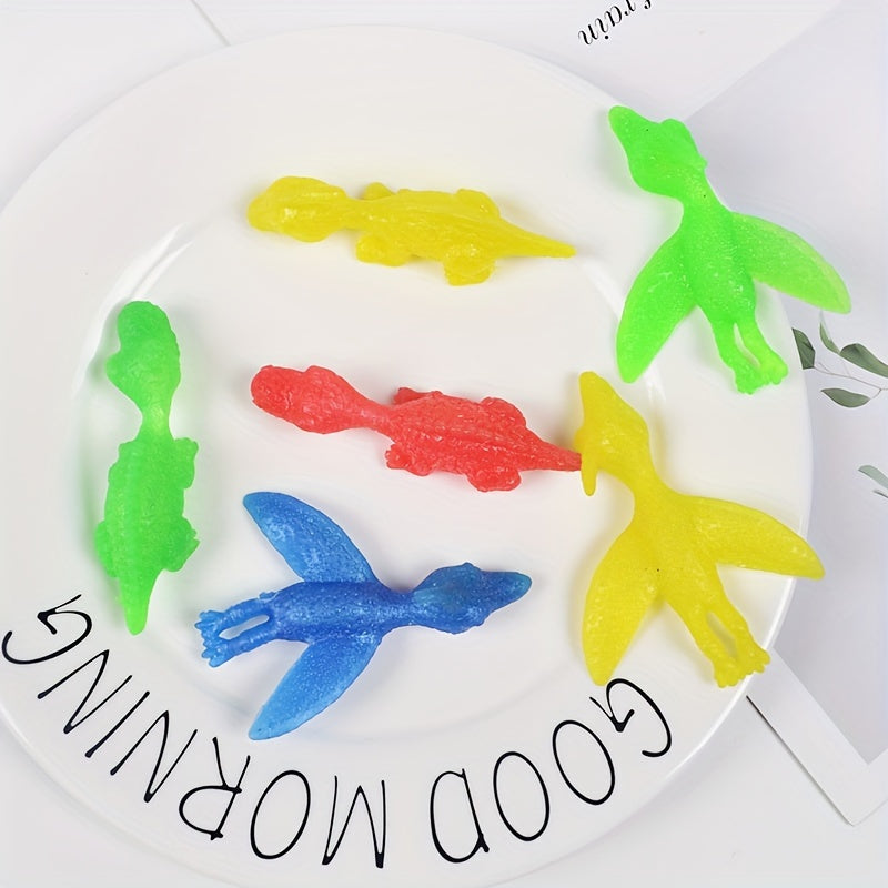 10PCS Ejection Dinosaur Finger Soft Slingshot Toy