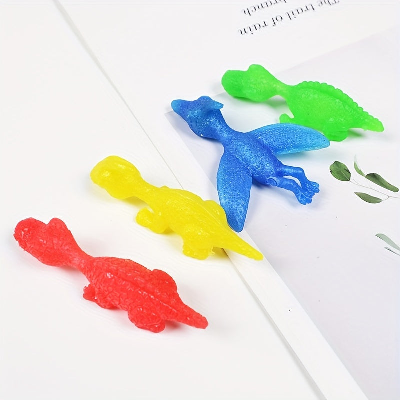 10PCS Ejection Dinosaur Finger Soft Slingshot Toy