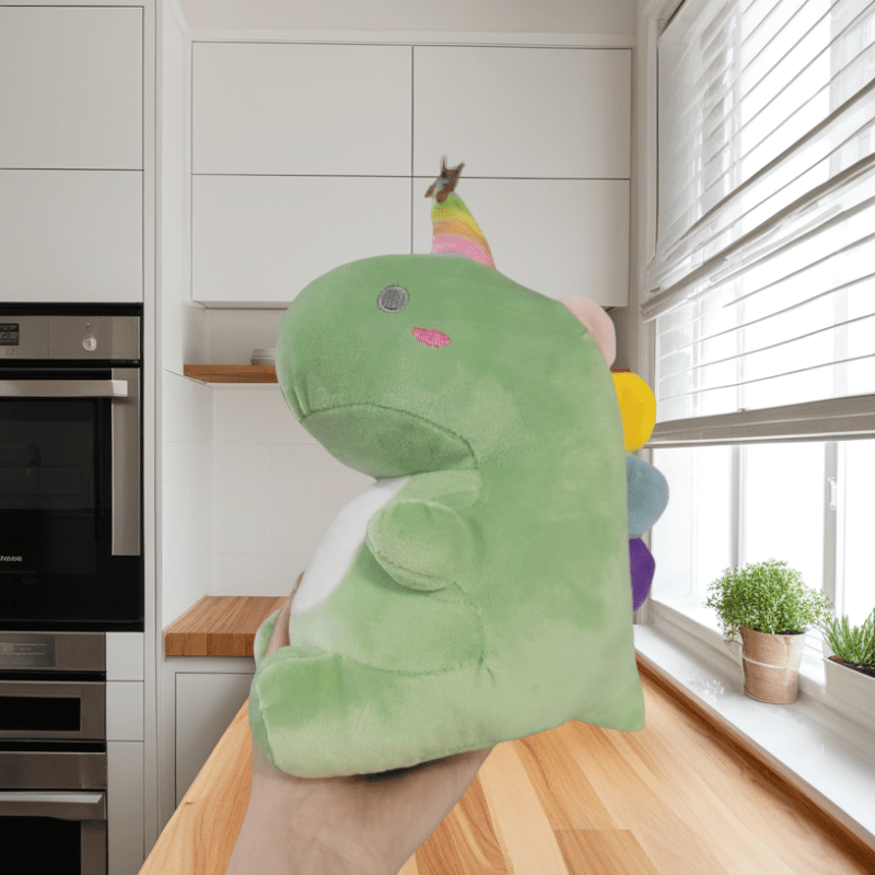 Soft Green Dinosaur Plush Toy with Pink Accents & Floral Accents