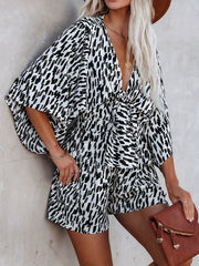  Polka Dot Striped Romper with Deep V Neck