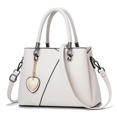 Embossed Pendant Decor PU Leather Shoulder Bag