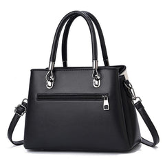 Embossed Pendant Decor PU Leather Shoulder Bag