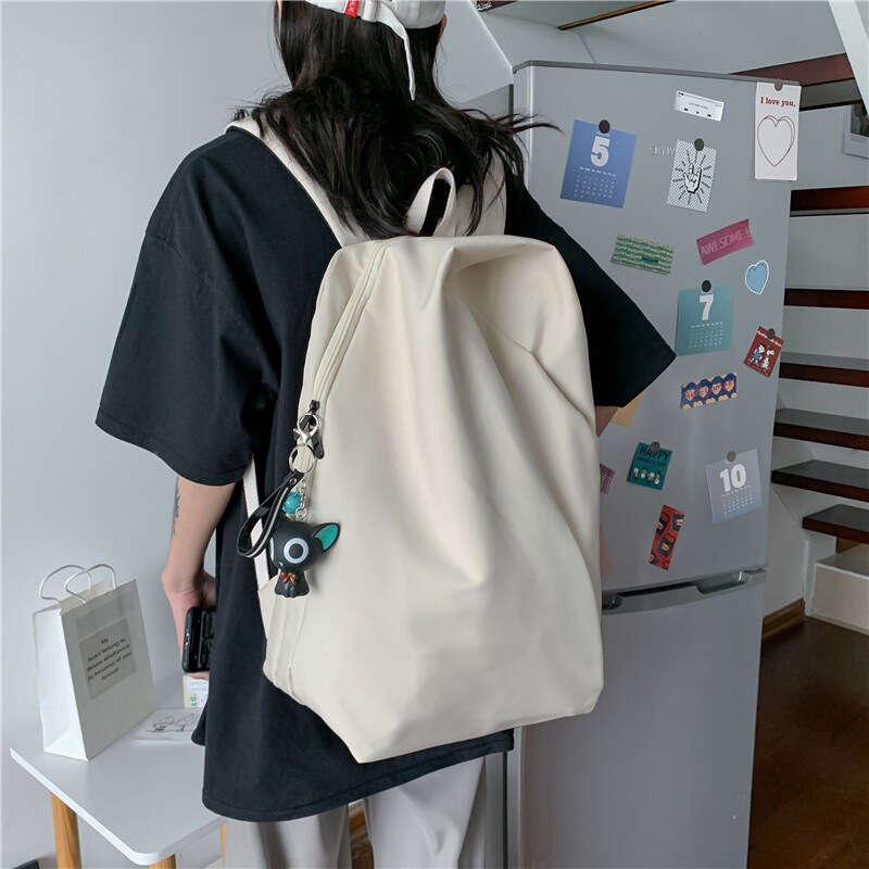 Casual Travel Large Capacity Backpack Pendant Men Women Schoolbag