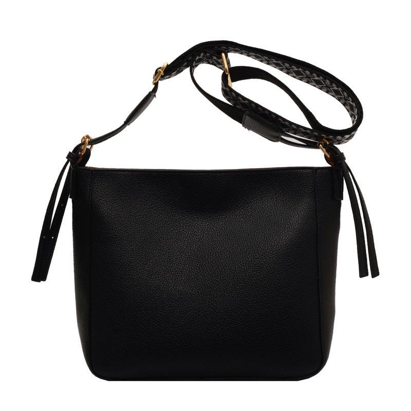 Minimalist Solid Shoulder Bag with Geometric Pattern Strap