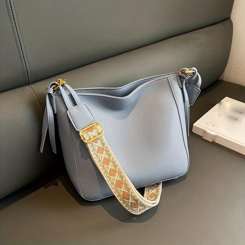 Minimalist Solid Shoulder Bag with Geometric Pattern Strap