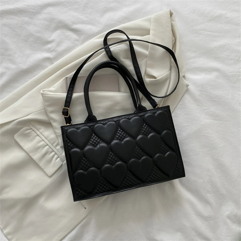 Textured Shoulder Bag with Heart Embossed Design
