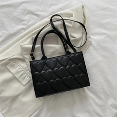 Textured Shoulder Bag with Heart Embossed Design