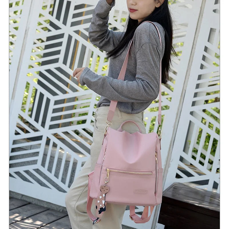 Female Backpack, Contrast Shoulders Bag Handbag with Cartoon Pendant in Wine Red