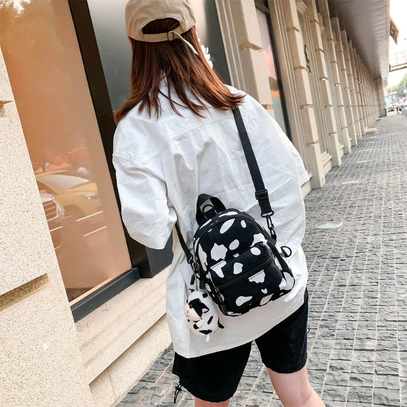 Cow Print Mini Canvas Daypack with Plush Pendant Backpack