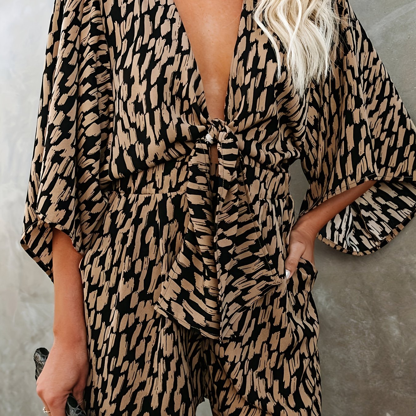  Polka Dot Striped Romper with Deep V Neck