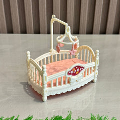 Plastic Dolls House Cradle Bed with Pastel Colors & Intricate Lace Patterns