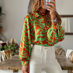  Animal Print Lantern Sleeve V Neck Blouse