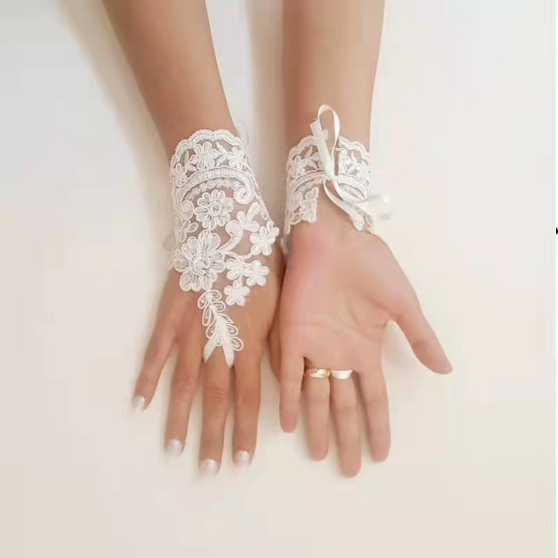 Floral Lace Fingerless Bridal Gloves with Flowers and Bow Accents