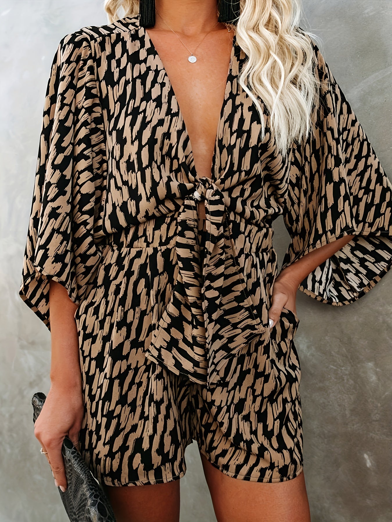  Polka Dot Striped Romper with Deep V Neck